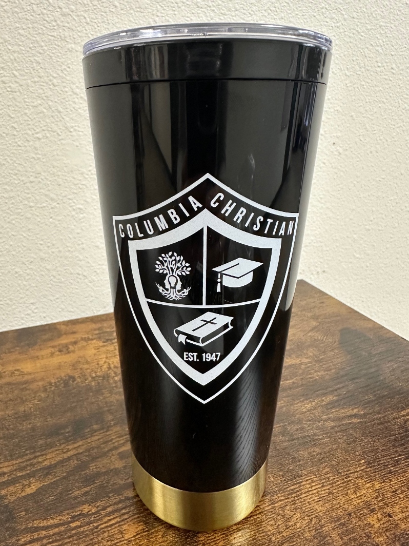 Product Description: Enjoy your beverages in style with our classic tumbler!</br>This 20 ounce cup is made of sturdy insulated plastic to keep your drink warm or cold.</br></br>The removable lid has a convenient slide closure. </br></br>Represent Columbia Christian School with the black & gold base colors and custom white logo.</br></br>Quantities are limited so get yours today!</br></br>Shipping is not available at this time. Purchaser must be willing to pick up from the main office during school hours.</br> Beverage Tumbler with Lid