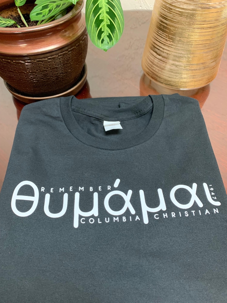 Product Description: Decades of Christian education are commemorated with our "Remember" T-Shirts. </br></br>The legacy of Kingdom service has been passed along through Columbia Christian Schools, Columbia Christian College, and Cascade College.</br></br>You can wear a part of history!</br></br>The front of the shirt includes the Greek word for "Remember", while the back displays a compass with the coordinates to the campus. </br></br>Color: Black, 100% Cotton, Sizes are limited so get yours today!</br></br>Shipping is not available at this time. Purchaser must be willing to pick up from the main office during school hours.</br> "Remember" T-Shirt