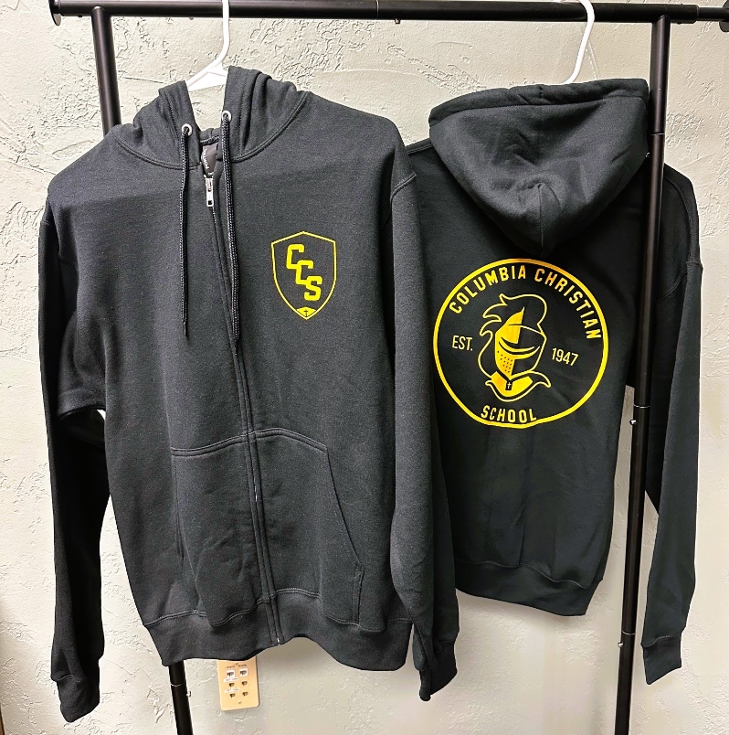 Product Description: Stay warm in style and show your school pride with our full-zip jacket! </br></br>Designed with comfort and performance in mind, this sleek jacket has a modern fit and durable fabric—perfect for students, parents, and friends of Columbia. </br></br>Whether you're cheering from the stands, heading to class, or just braving chilly mornings, this jacket is the ultimate blend of function and school spirit. </br></br>Don’t miss your chance to represent the Knights in standout fashion. </br></br>Quantities are limited—get yours today!</br></br>Front: CCS Shield, Back: Circle Logo with Knight Helmet</br></br>Color: Jet Black </br></br>Soft Blend: 50 cotton/50 polyester</br></br>Shipping is not available at this time. Purchaser must be willing to pick up from the main office during school hours.</br> Black Full-Zip Jacket with Hood